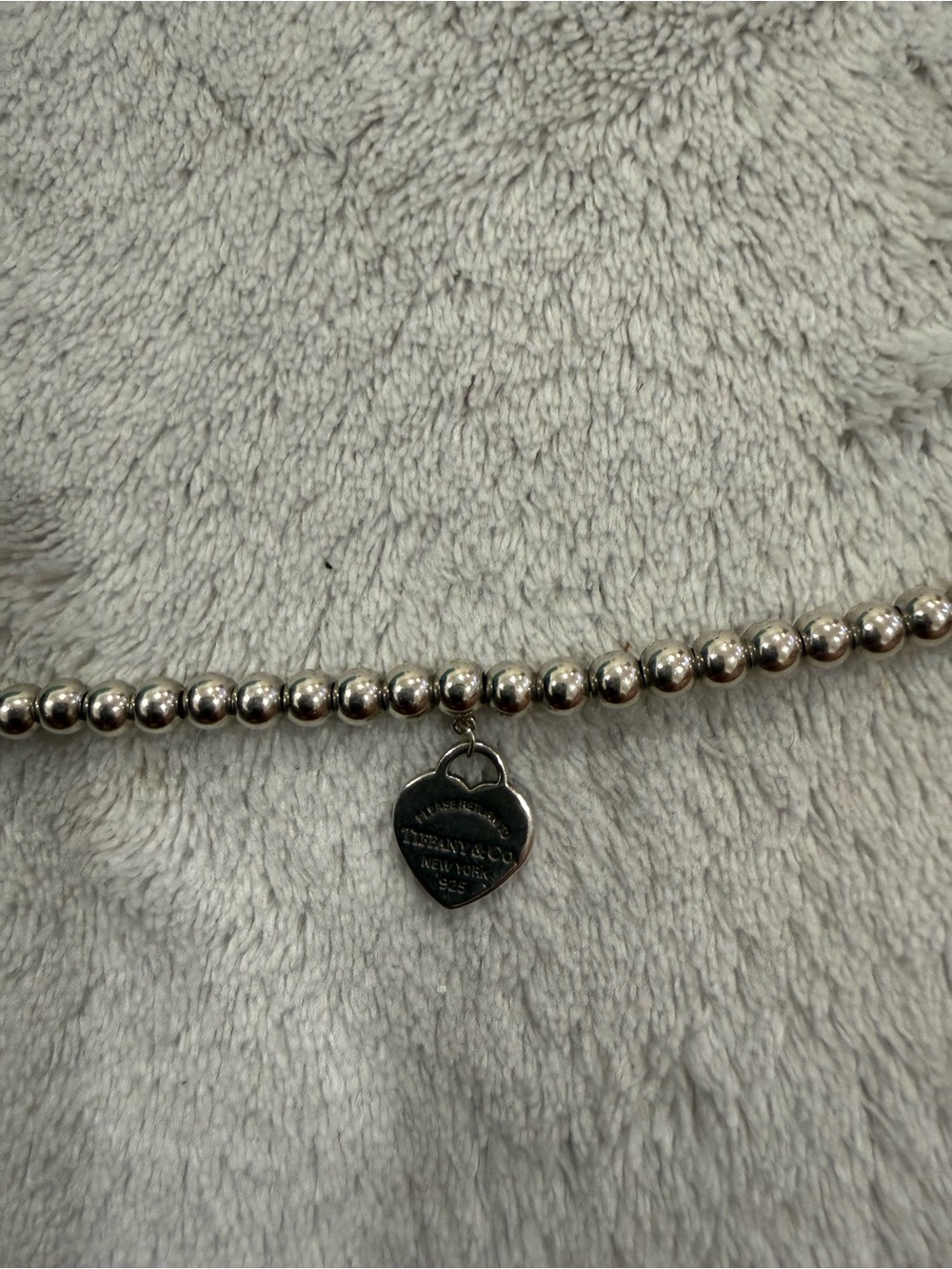 Tiffany & Co. Sterling Silver Bead Necklace with Heart Tag Charm
Size 4mm
Medium